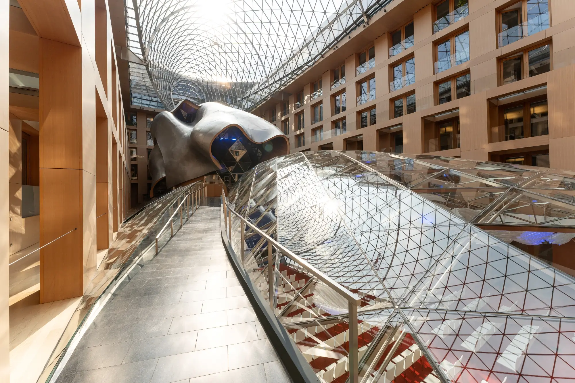 AXICA atrium illuminated for an evening event